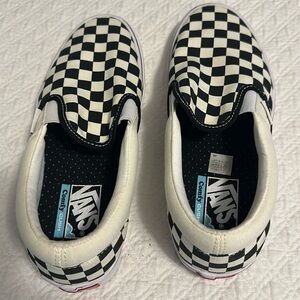Vans Black and White Checker board slip Ons Men’s 7.5, never worn